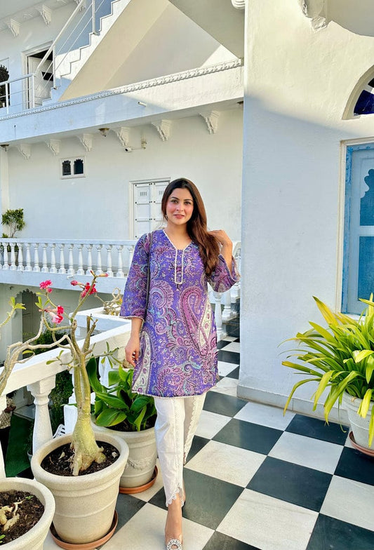 'Lavender Paisley Print Suit Set This is a three piece lawn paisley print suit set. The set includes Kurta,Tulip Pants and Dupatta