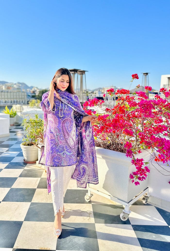 'Lavender Paisley Print Suit Set This is a three piece lawn paisley print suit set. The set includes Kurta,Tulip Pants and Dupatta