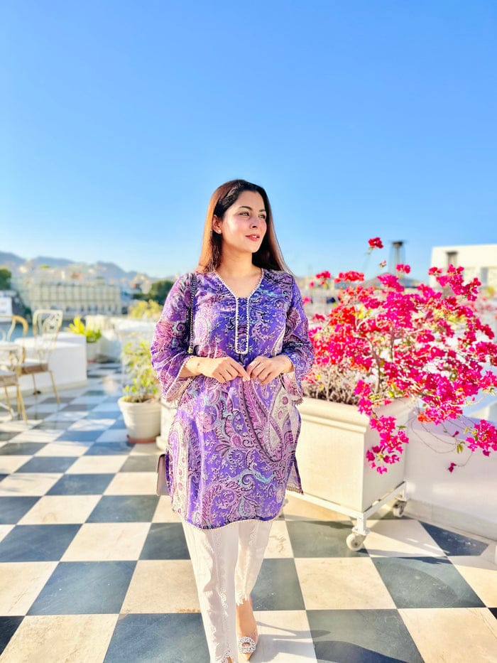 'Lavender Paisley Print Suit Set This is a three piece lawn paisley print suit set. The set includes Kurta,Tulip Pants and Dupatta